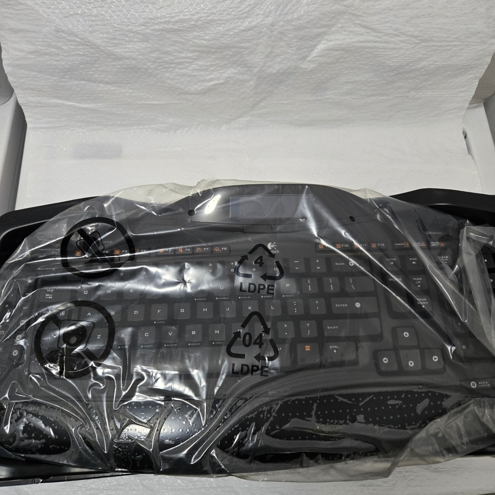 Logitech MX 5500 Revolution Bluetooth Cordless Keyboard Dynamic LCD Display